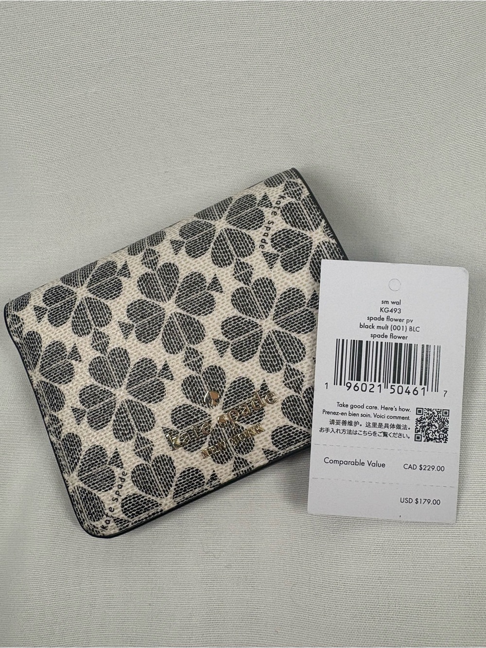 Kate Spade Signature Spade Flower Small Bifold Wallet in Black Multi